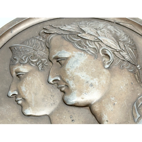 13 - An Early 19th Century Andrieu fecit bronze plaque of Napoleon and Marie Louise. 14cm