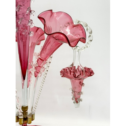 14 - A large Victorian cranberry glass epergne. 36x60cm