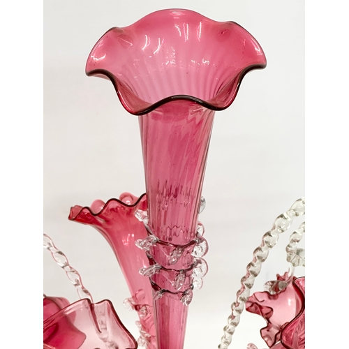 14 - A large Victorian cranberry glass epergne. 36x60cm