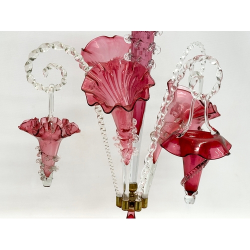 14 - A large Victorian cranberry glass epergne. 36x60cm