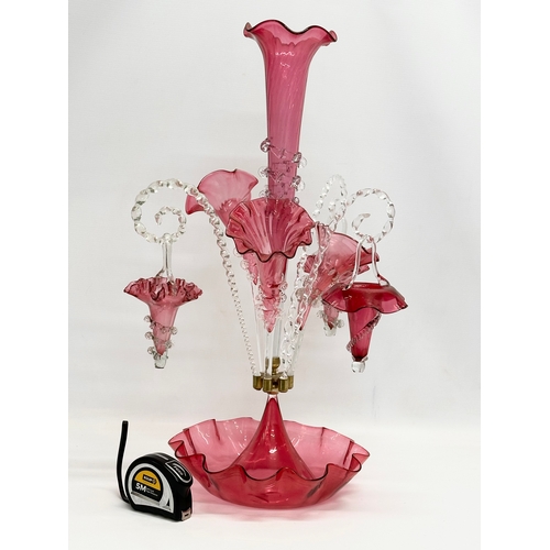 14 - A large Victorian cranberry glass epergne. 36x60cm