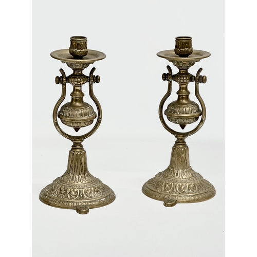 16 - A pair of Late 19th/Early 20th Century brass nautical ships pendulum wall mounted candleholders. 27c... 