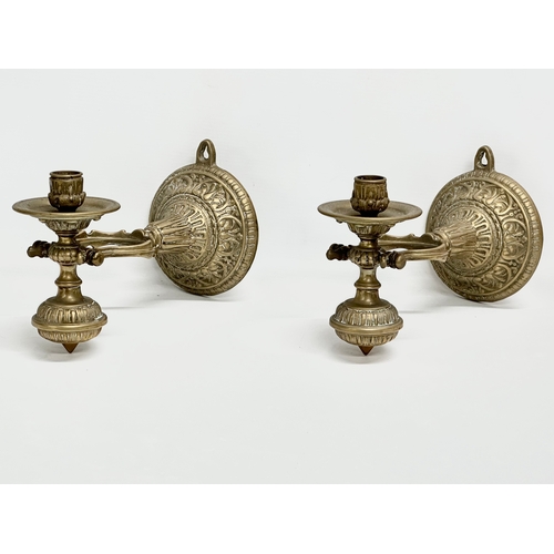 16 - A pair of Late 19th/Early 20th Century brass nautical ships pendulum wall mounted candleholders. 27c... 