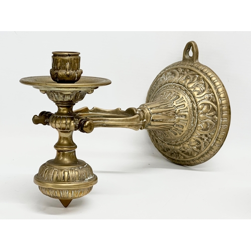 16 - A pair of Late 19th/Early 20th Century brass nautical ships pendulum wall mounted candleholders. 27c... 