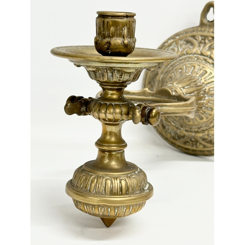 16 - A pair of Late 19th/Early 20th Century brass nautical ships pendulum wall mounted candleholders. 27c... 