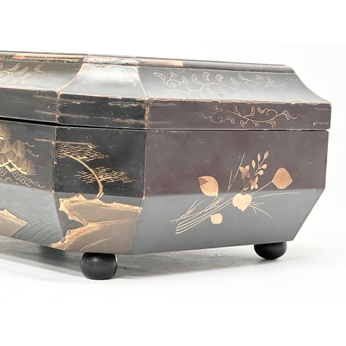 102 - A large Late 19th Century Japanese lacquered jewellery box/storage box, with hand painted embossed b... 