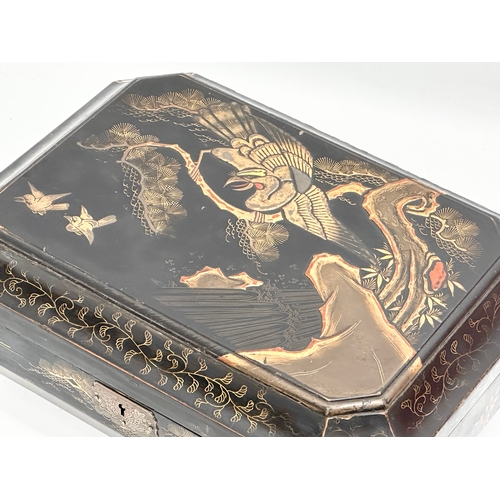 102 - A large Late 19th Century Japanese lacquered jewellery box/storage box, with hand painted embossed b... 