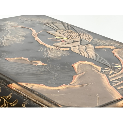 102 - A large Late 19th Century Japanese lacquered jewellery box/storage box, with hand painted embossed b... 