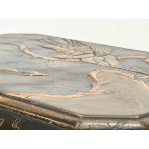 102 - A large Late 19th Century Japanese lacquered jewellery box/storage box, with hand painted embossed b... 