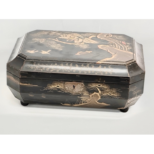 102 - A large Late 19th Century Japanese lacquered jewellery box/storage box, with hand painted embossed b... 