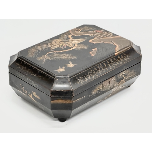 102 - A large Late 19th Century Japanese lacquered jewellery box/storage box, with hand painted embossed b... 