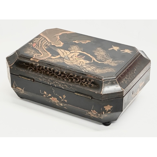 102 - A large Late 19th Century Japanese lacquered jewellery box/storage box, with hand painted embossed b... 