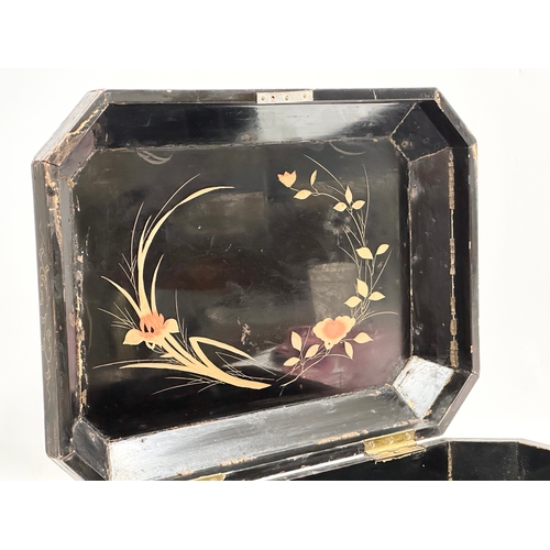 102 - A large Late 19th Century Japanese lacquered jewellery box/storage box, with hand painted embossed b... 