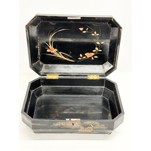 102 - A large Late 19th Century Japanese lacquered jewellery box/storage box, with hand painted embossed b... 