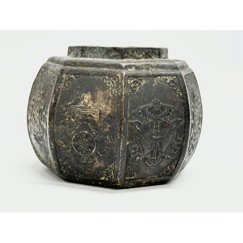 18 - An 18th/19th Century Chinese 8 Treasures bronze tank jar. Seal mark underneath. 7.5x7.5x6cm