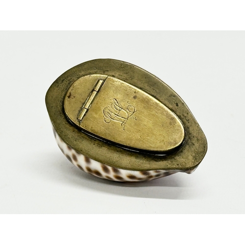 48 - A Late 18th/Early 19th Century cowrie shell snuff box. 8x5x3.5cm