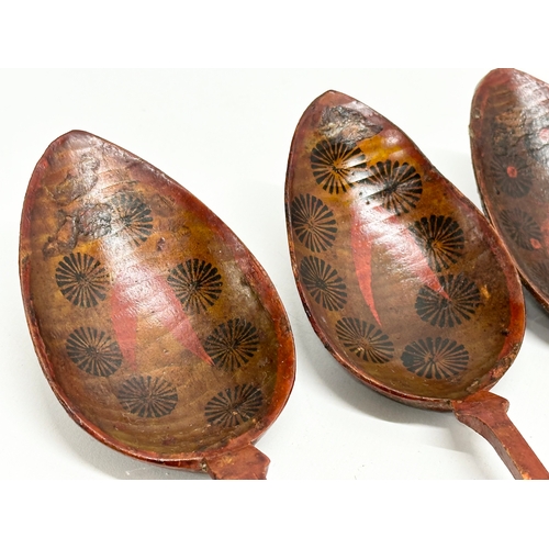 51 - A set of 6 19th Century Folk Art hand painted treen ware spoons. Probably Russian. 21cm