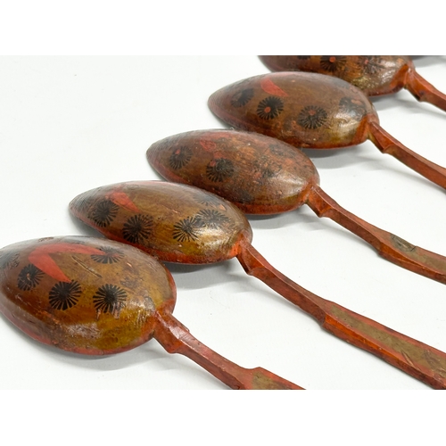 51 - A set of 6 19th Century Folk Art hand painted treen ware spoons. Probably Russian. 21cm