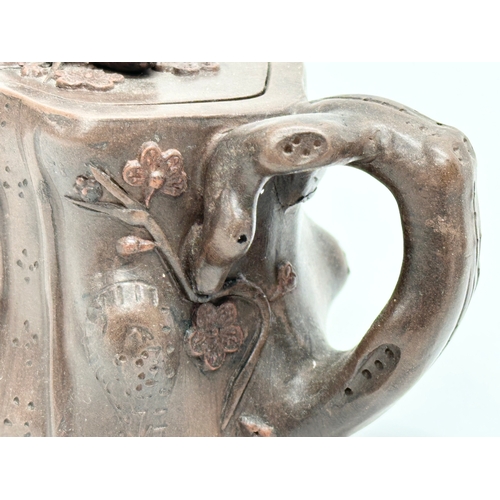 118 - An Early 20th Century Yixing clay ‘tree stump’ teapot with cover. Impressed seal mark. 17x9x8.5cm