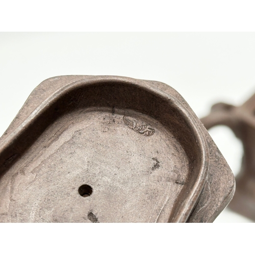 118 - An Early 20th Century Yixing clay ‘tree stump’ teapot with cover. Impressed seal mark. 17x9x8.5cm