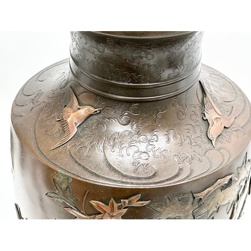 139 - A large Late 19th Century Japanese bronze pot. Attributed too Miyabe Atsuyoshi. Decorated with relie... 