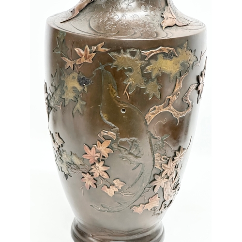 139 - A large Late 19th Century Japanese bronze pot. Attributed too Miyabe Atsuyoshi. Decorated with relie... 