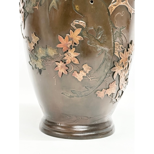 139 - A large Late 19th Century Japanese bronze pot. Attributed too Miyabe Atsuyoshi. Decorated with relie... 