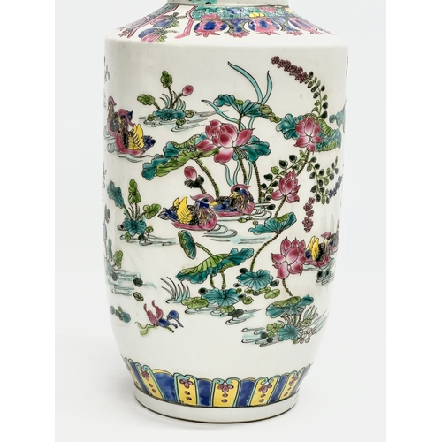 140 - A large Late 19th/Early 20th Century Chinese Kangxi style famille rose vase. 6 character mark. 43cm