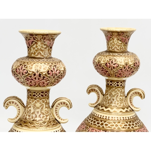 10 - Zsolnay Pecs. A pair of Late 19th Century Islamic style vases by Zsolnay Pecs. Impressed mark and pr... 