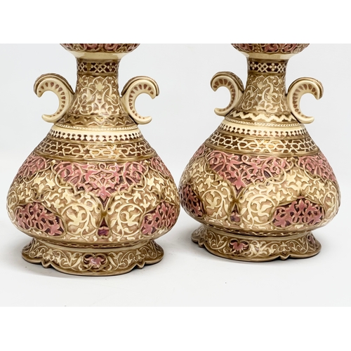 10 - Zsolnay Pecs. A pair of Late 19th Century Islamic style vases by Zsolnay Pecs. Impressed mark and pr... 