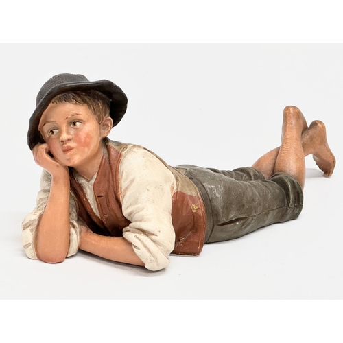 156 - An Eichwald Bohemian painted terracotta ‘peasant boy’ figurine by Bernhard Bloch. 22cm