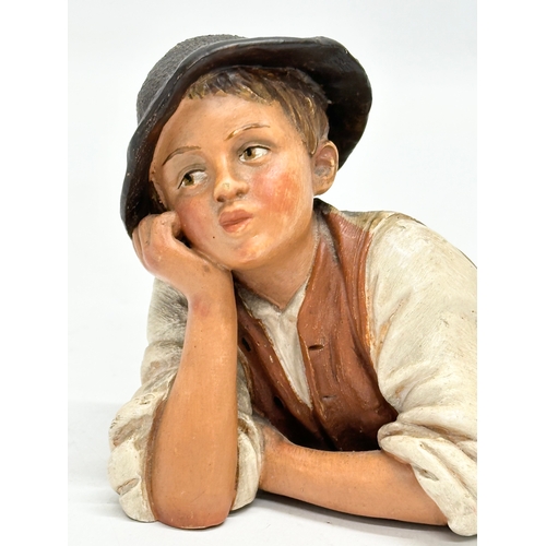 156 - An Eichwald Bohemian painted terracotta ‘peasant boy’ figurine by Bernhard Bloch. 22cm