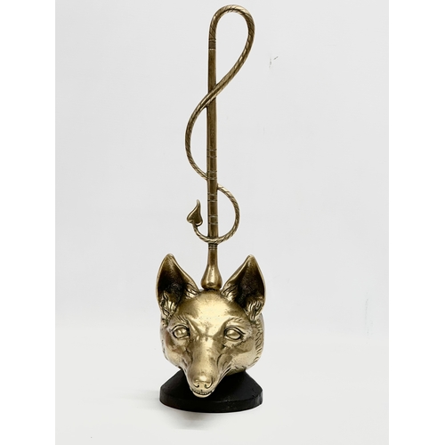 15 - A large Peerage English brass ‘fox’ doorstop. Late 19th/Early 20th Century. 1890-1920. 46cm