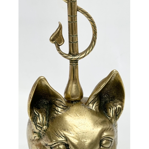 15 - A large Peerage English brass ‘fox’ doorstop. Late 19th/Early 20th Century. 1890-1920. 46cm