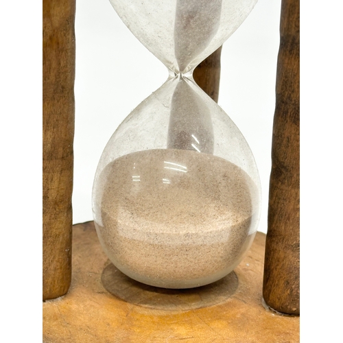 149 - A Late 19th/Early 20th Century Industrial Bobbin Hourglass/sand timer. 13x19cm