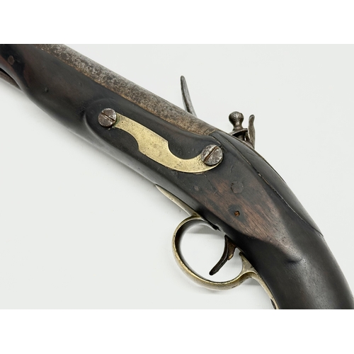 23 - A Late 18th/Early 19th Century George III Flintlock pistol. 40cm