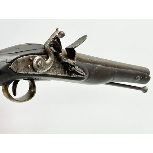 23 - A Late 18th/Early 19th Century George III Flintlock pistol. 40cm