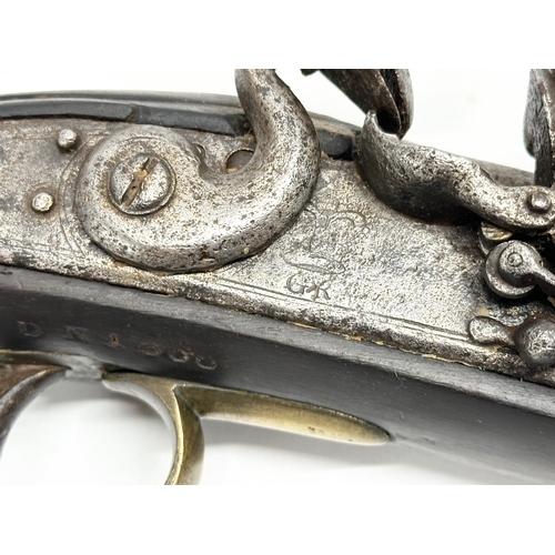 23 - A Late 18th/Early 19th Century George III Flintlock pistol. 40cm