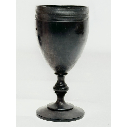 163 - A collection of 19th Century ebony treen ware. 12cm