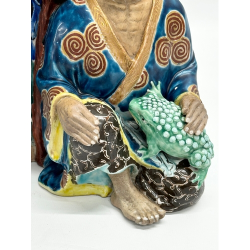 164 - A large Early 20th Century Japanese ‘Immortals’ figurine. 21x33cm