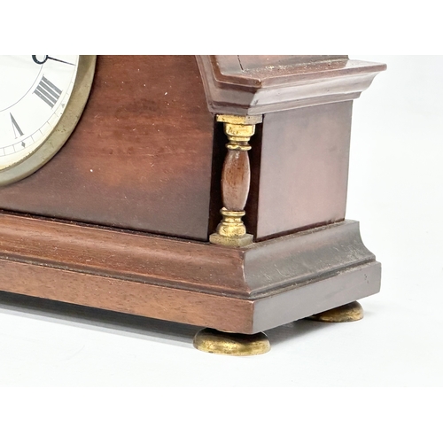 167 - An S.D. Neill mahogany cased mantle clock. Swiss works. Early 20th Century. Circa 1900-1910. 23x9x15... 