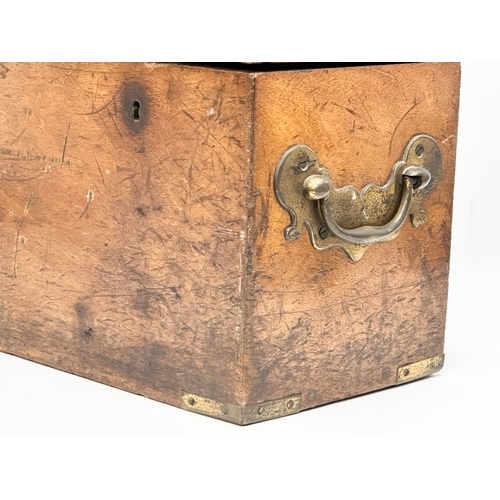 26 - An Early 19th Century campaign lock box. 47x20x26cm