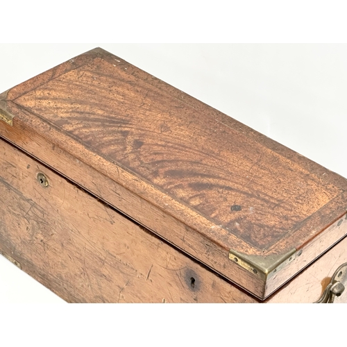 26 - An Early 19th Century campaign lock box. 47x20x26cm