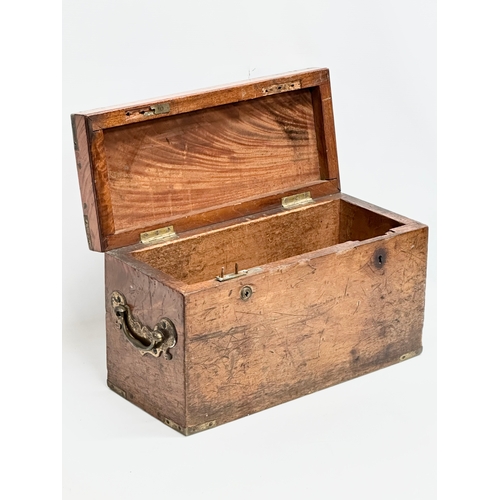 26 - An Early 19th Century campaign lock box. 47x20x26cm