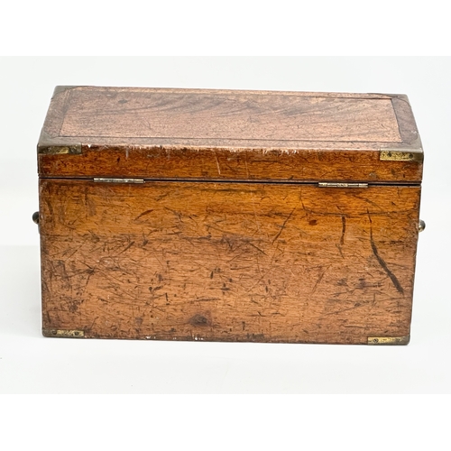 26 - An Early 19th Century campaign lock box. 47x20x26cm