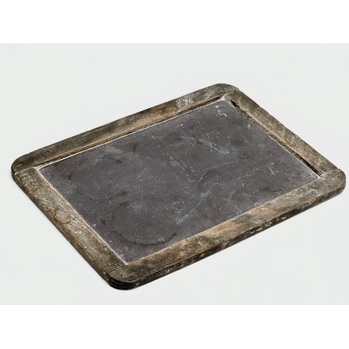 184 - A 19th Century slate chalk board. 28x20.5cm