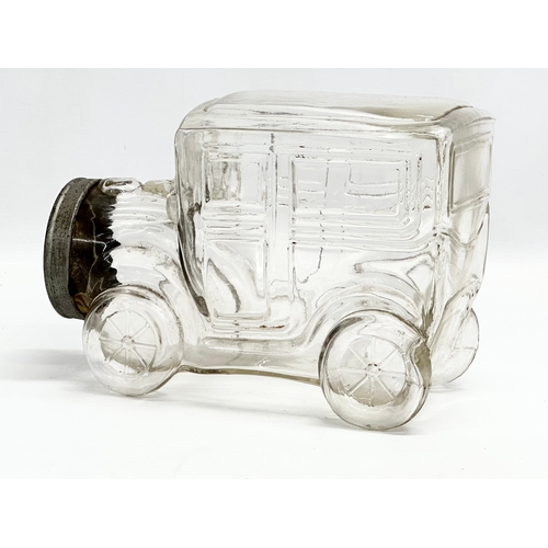 186 - A large Libbey Glass automobile jar with lid. 1930-1950. 23x12x16cm