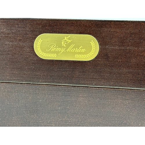 190 - A Remi Martin cognac writing slope. 50.5cm open. 24x24.5x14.5cm closed.