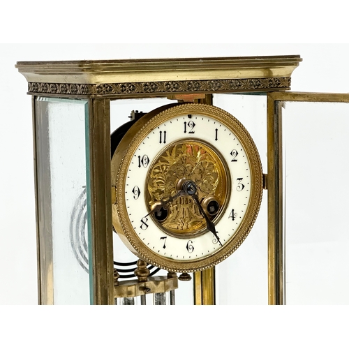 36 - A large Late 19th Century French brass mantle clock with 4 bevelled glass panels and mercury pendulu... 