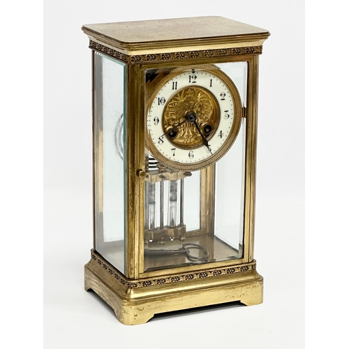 36 - A large Late 19th Century French brass mantle clock with 4 bevelled glass panels and mercury pendulu... 